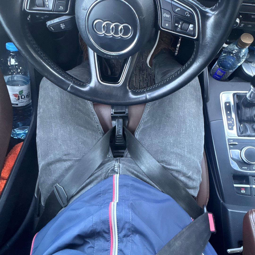 AJUSTEUR DE CEINTURE DE SÉCURITÉ